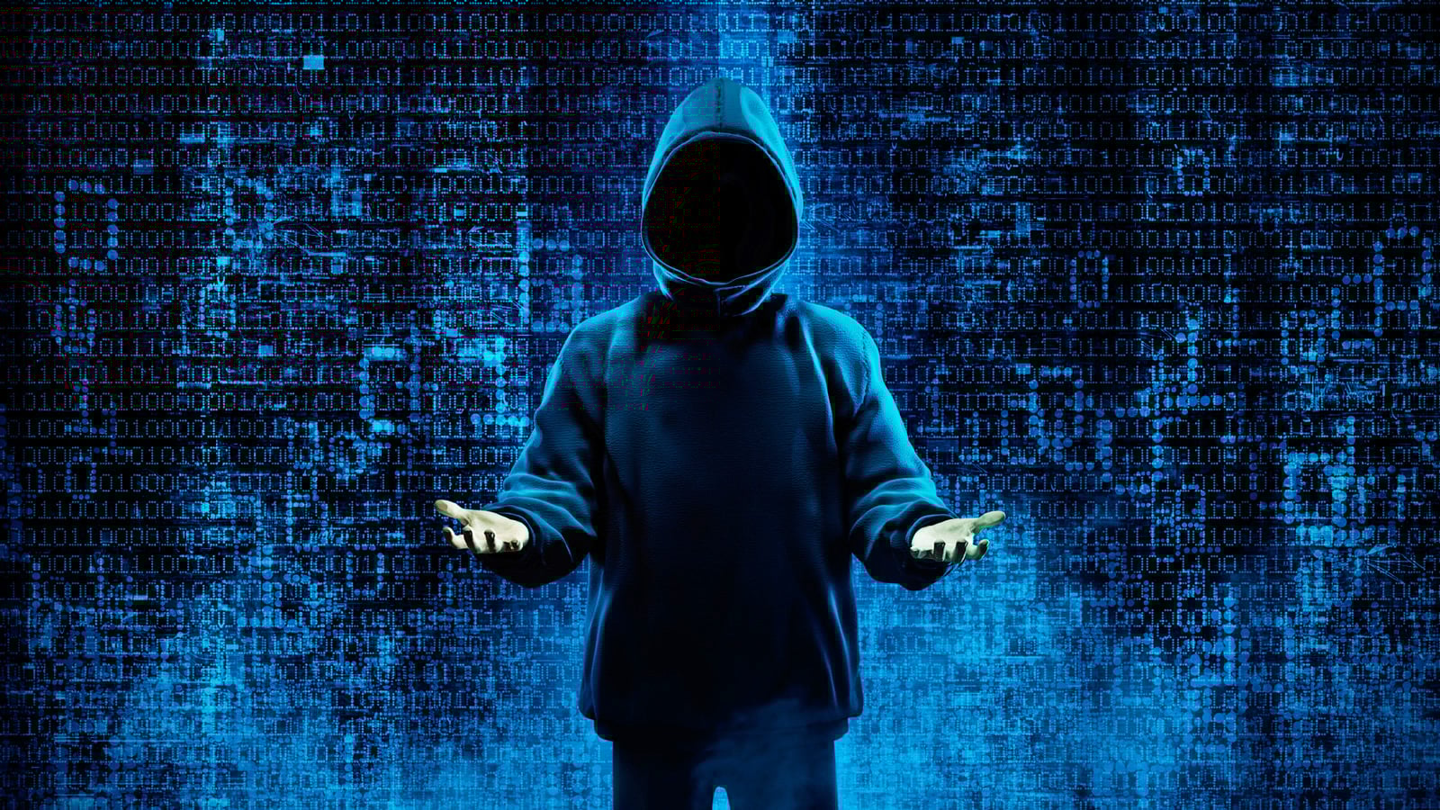 Hacker holding hands up